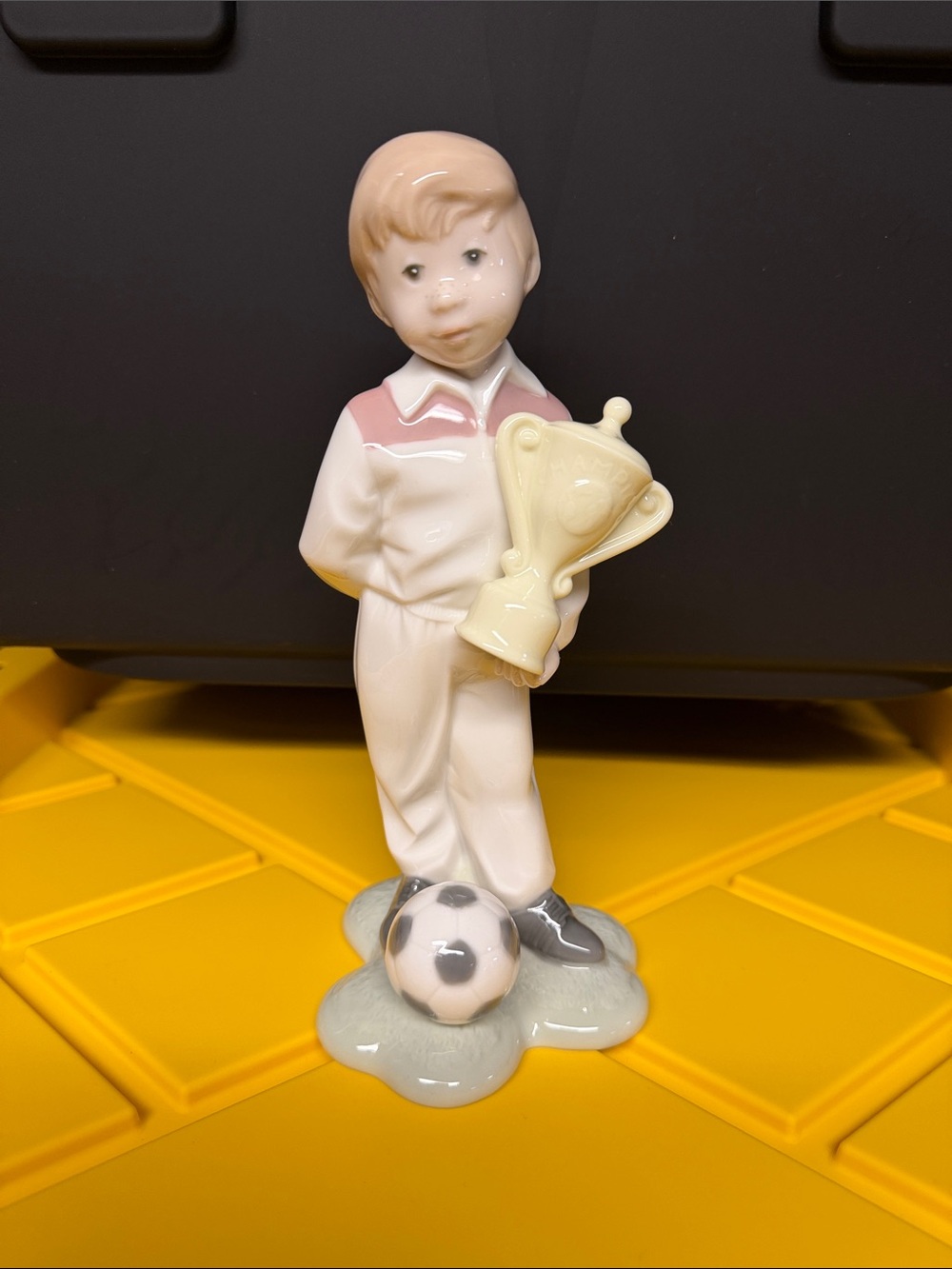 Lladro Porcelain Boy with Trophy and Soccer Ball - White & Pink
